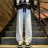 Pantalones de Calle Americanos para Hombre Primavera Otoño 2026 Nueva Marca de Tendencia Versátiles Sueltos Pierna Recta Sentido del Diseño Estrellas Pantalones Casuales