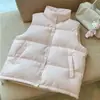 Chaleco acolchado rosa con cuello alto, prenda exterior sin mangas holgada estilo coreano para el invierno 2026