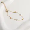 Pulsera Elegante de Moda Corazón Pequeño Circonita Azul y Blanca Acero de Titanio para Mujer Cadena Fina Exquisita Lujo Ligero Joyería de Mano Transfronteriza Corazón de Melocotón Cruz