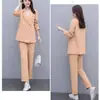 Elegante y estiloso conjunto de traje para mujer para primavera y otoño, con un blazer cruzado de solapa y pantalones de corte ajustado, un conjunto de dos piezas juvenil y profesional