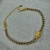 Anillo Corredor Dorado de Explosiones de Libro de Caperucita Roja Pulsera de Oro Negro Cadena Estilo Chanel Simple y a la Moda para Mujer Cuerda de Mano Trenzada Flash Cepillada
