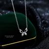 Collar de Plata Pura S999 Mariposa Hueca para Mujer, Diseño Minimalista de Lujo Ligero, Cadena para Clavícula con Colgante de Nicho de Gama Alta