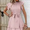 Vestido de Bolinhas Estilo Férias Transfronteiriças Verão 2026 Estilo Europeu e Americano Vestido de Mangas Curtas com Babados e Botões de Amarração Linha A para Mulheres
