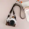 Adecuado para funda de cámara Canon R50 R10 micro cámara única funda protectora R100 bolsa base accesorios R5 funda de cuero funda protectora linda