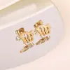 No es necesario quitarse los pendientes al ducharse, tachuelas para el cartílago de titanio, pendientes de gota de aceite, accesorios de diseño para el día a día, joyería de oído de moda al por mayor