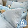 Juego de cama de cuatro piezas Clase A hecho de algodón puro tipo puff, sábana y funda de edredón estilo ins frescas y delicadas con borde de concha, juego de tres piezas para dormitorios de estudiantes