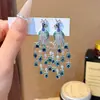 Brincos Longos Europeus e Americanos Transfronteiriços Resistentes com Zircônia Incrustada, Estilo Levemente Luxuoso, Brincos com Franjas de Pavão, Acessórios para Vestido de Noite