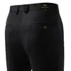 Moda Otoño 2025 Nueva Tendencia para Hombre Pantalones Largos Casuales Elásticos en Cuatro Direcciones Holgados Rectos Pantalones de Traje