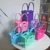 Bolsa de Almacenamiento de Playa Nueva de EVA Transfronteriza para Niños Bolsa de Playa Tipo Tote Nueva Europea y Americana Bolsa de Agujeros de EVA Cesta de Verduras