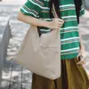 Bolso Versátil de Gran Capacidad Portátil Estilo Coreano para Mujer 2026 Nueva Moda Casual Bolso de Hombro de Nailon de Moda