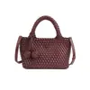 2026 Nova Bolsa de Mão Tecida Artesanal de Couro Macio de Alta Qualidade Versátil Moda Bolsa de Mão Estilo Cesta Bolsa de Ombro Bolsa de Braço