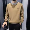 Sudadera juvenil estilo coreano de dos piezas falsas para hombre, elegante y genial, jersey de retazos, nuevo top Maillard de manga larga de alta gama