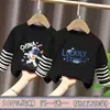 Ropa para niños para niños, camiseta de manga larga de retazos, imitación de dos piezas, camiseta base de algodón puro para niños mayores, nuevo estilo de top para primavera y otoño 2026