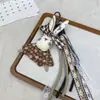Estilo Coreano Nuevo Tela Rellena de Algodón Gato y Conejo de Dibujos Animados Llavero Delantal de Moda Conejo Broche Colgante Accesorio Versátil para Bolso