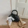Bolso de bowling de lunares de nicho estilo francés para chica 2026 nuevo bolso de mano compacto simple casual exquisito