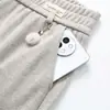 Pantalones rectos ajustados para madres, pantalones largos adelgazantes, nuevo modelo 2026, pantalones para mujeres de mediana edad y mayores de 50 años, pantalones de pierna ancha de cachemira sintética para mujer
