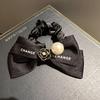 Banda para el cabello con lazo de camelia perlada estilo Chanel de Corea del Sur, coleta alta, banda de goma, coleta de alta calidad, cuerda para el cabello