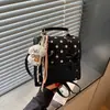 Mochila de puntos estilo coreano transfronteriza para mujer, nueva mochila versátil y elegante 2026 para estudiantes para ir al trabajo