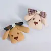 26 Estilos Nuevos de Accesorios para Pasadores de Pelo, Broches, Bolsas, Ropa, Sombreros, Zapatos, Calcetines y Accesorios de Vestimenta con Relleno de Algodón en Forma de Cachorro y Moño
