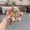 Pingente Cachecol Pônei de Pelúcia Pingente Dourado Yuan Bebê Presente de Ano Novo Chaveiro Criativo Ano do Cavalo Atacado