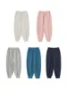 Calça jogger esportiva lisa nova de outono 2026 para meninas Wulibu, solta e durável, calça longa casual para crianças, moderna
