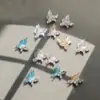 Nuevos Accesorios para Uñas Qiansi Mengdie Circonia Tres Dimensionales Doble Capa Super Brillantes Mariposa Terminada Pila de Diamantes Decoración de Uñas Venta al por Mayor