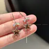 Pendientes de Cadena con Borlas de Lazo de Estrella Estampado de Leopardo Retro Estilo Hong Kong para Mujer Pendientes de Gancho Únicos de Lujo Ligero de Gama Alta