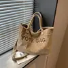 Bolso de mujer de color liso, gran capacidad, pana, nuevo diseño 2026, estampado de letras elegante, bolso de mano, bolso de hombro