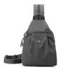 Mini Mochila 2025 Nueva Simple Versátil Antirrobo Bolso de Pecho para Mujer Moda Tela Oxford Casual Mochila Pequeña