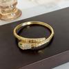 Pulseira de fivela caleidoscópio de quatro folhas requintada com incrustação de zircônia em cobre para mulheres, moda, combina com tudo, senso de alta qualidade, pulseira de estilo antigo médio, atacado