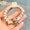 Corea del Sur Dongdaemun con anillo para el cabello de oso de pedrería, lindo para niña, banda para el cabello de alta elasticidad, cuerda para moño, estuche de cuero