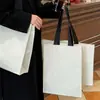 2025 Nueva Tienda de Ropa de Alta Gama Bolso de Mano Empaque para Ropa de Mujer Bolsa de Compras Grande Tejida Tridimensional Mayoreo
