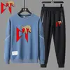 Traje Deportivo Casual de Primavera y Otoño para Hombre Estilo Europeo y Americano Estampado de Letras Juvenil Sudadera de Cuello Redondo y Pantalones Conjunto de Dos Piezas Listo para la Venta