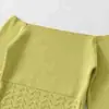 Atacado de roupas femininas da moda estilo europeu e americano: Conjunto de top de malha oca de um ombro só e saia, com alta elasticidade, leve e que ilumina a pele