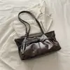 Bolsa de Ombro Estilo Coreano Transfronteiriça de Nicho 2026 Verão Nova Grande Capacidade Versátil para o Dia a Dia Bolsa Tote Ombro Único Feminina