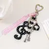 Llavero Colgante para Bolso con Diseño de Lunares Rayas Notas Musicales Estrellas Vintage Japonés y Coreano Accesorio Creativo Lindo Divertido Regalo para Mejores Amigos
