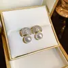 Pendientes de abanico de alta gama con sentido francés, totalmente de diamantes, pendientes de moda exquisitos de alta gama, pendientes de perlas gentiles y elegantes