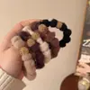 Cuerda para el pelo de nuevo estilo 2024 para niñas, Cuerda de goma para el pelo elegante, Goma para el pelo elegante y con clase, Accesorio para el pelo con funda de cuero simple