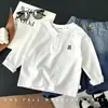 Nueva camiseta de manga larga con cuello Henry para niños, niños y niñas, holgada y versátil, estilo coreano y británico, adecuada para primavera y otoño