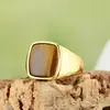 Joyería de comercio exterior al por mayor moda simple anillo de piedra negra para hombres y mujeres de acero de titanio en stock al por mayor