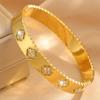 Pulsera de Acero Inoxidable, Lujo Ligero Transfronterizo, No se Desvanece, Pulsera de Trébol de Cuatro Hojas Incrustada con Diamantes, Pulsera de Pareja Chapada en Oro de 18 Quilates al por Mayor