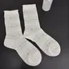 Nuevos calcetines para mujer de primavera y verano, calcetines de rejilla con patrón floral oscuro de botones, calcetines de tubo hueco, calcetines de pila, color sólido, calcetines finos estilo coreano