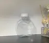 Botella redonda plana creativa para té de leche 320ml botella desechable para bebidas de mascota red social popular taza de plástico coco para jugo té de leche