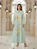 NT06 Superventas transfronterizo: Elegante vestido largo de malla jacquard estampado, nuevo modelo de Malasia