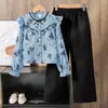Conjunto para Niñas Comercio Exterior Ropa Infantil 2026 Primavera Nueva Moda Camisa de Manga Larga con Estampado de Encaje y Pantalones de Pierna Ancha Conjunto de Dos Piezas