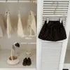 ¡LeenbabyKabo Susurros Dulces! Conjunto de top de doble capa con cuello de volantes y falda con lazo para niñas de otoño