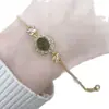 Nuevo brazalete estilo chino de gota de agua verde transparente para mujer, cadena para la clavícula y anillo de lujo ligero de nicho exquisitos de alta gama a la moda