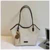 Bolsa casual retro de gran capacidad Shuai Mi Home 2026 otoño nuevo bolso de hombro para mujer de uso diario bolso tote para estudiante universitario
