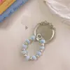 Pulseira de bola de pelúcia estilo ins acessórios fofos cordão para celular acessórios para capa de celular Apple 16 Samsung acessórios