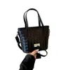 2026 Moda Nueva Textura Tejida Cesta de Mano para Verduras Bolso para Mujer Sensación de Alta Gama Diseño de Nicho Bolso Versátil de Hombro Cruzado